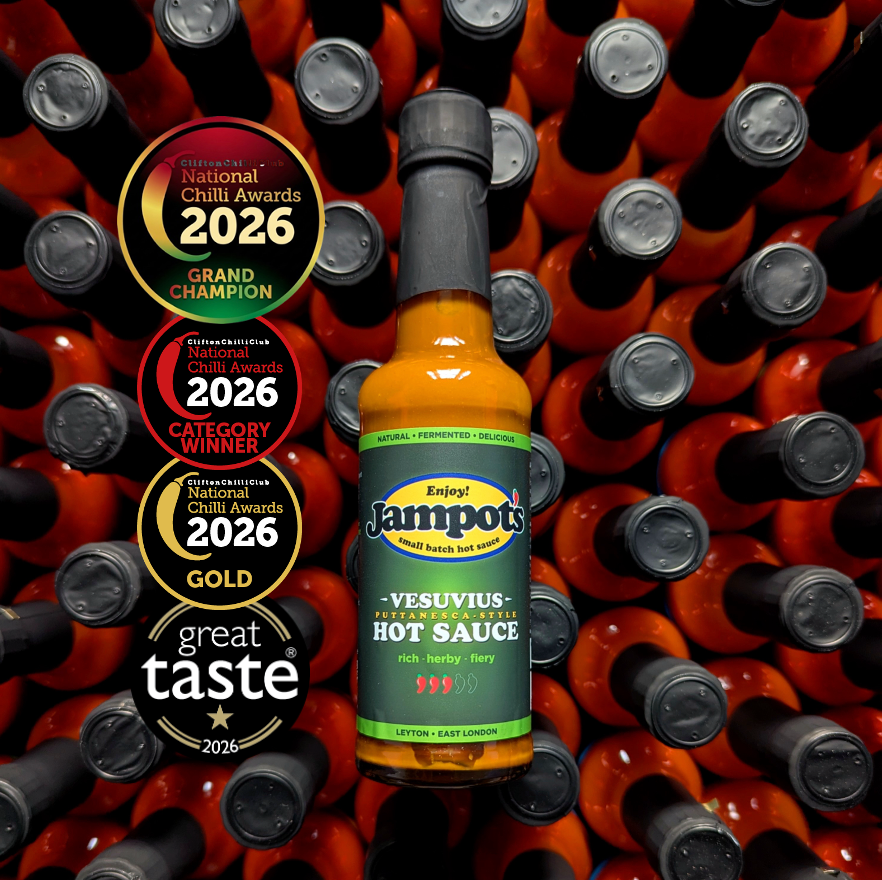 Jampot's award-winning, "Vesuvius" - Puttanesca-style hot sauce bottle, with awards on a background of more hot sauce bottles