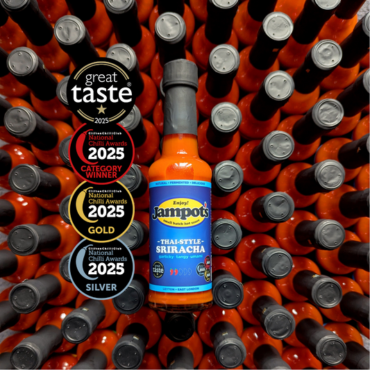 Jampot's award-winning Thai-style Sriracha bottle surrounded by more bottles.