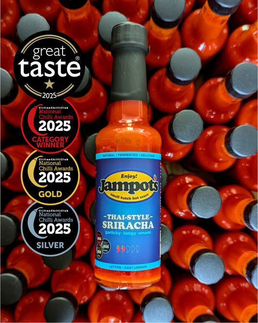 Jampot's award-winning Thai-style Sriracha bottle surrounded by more bottles.