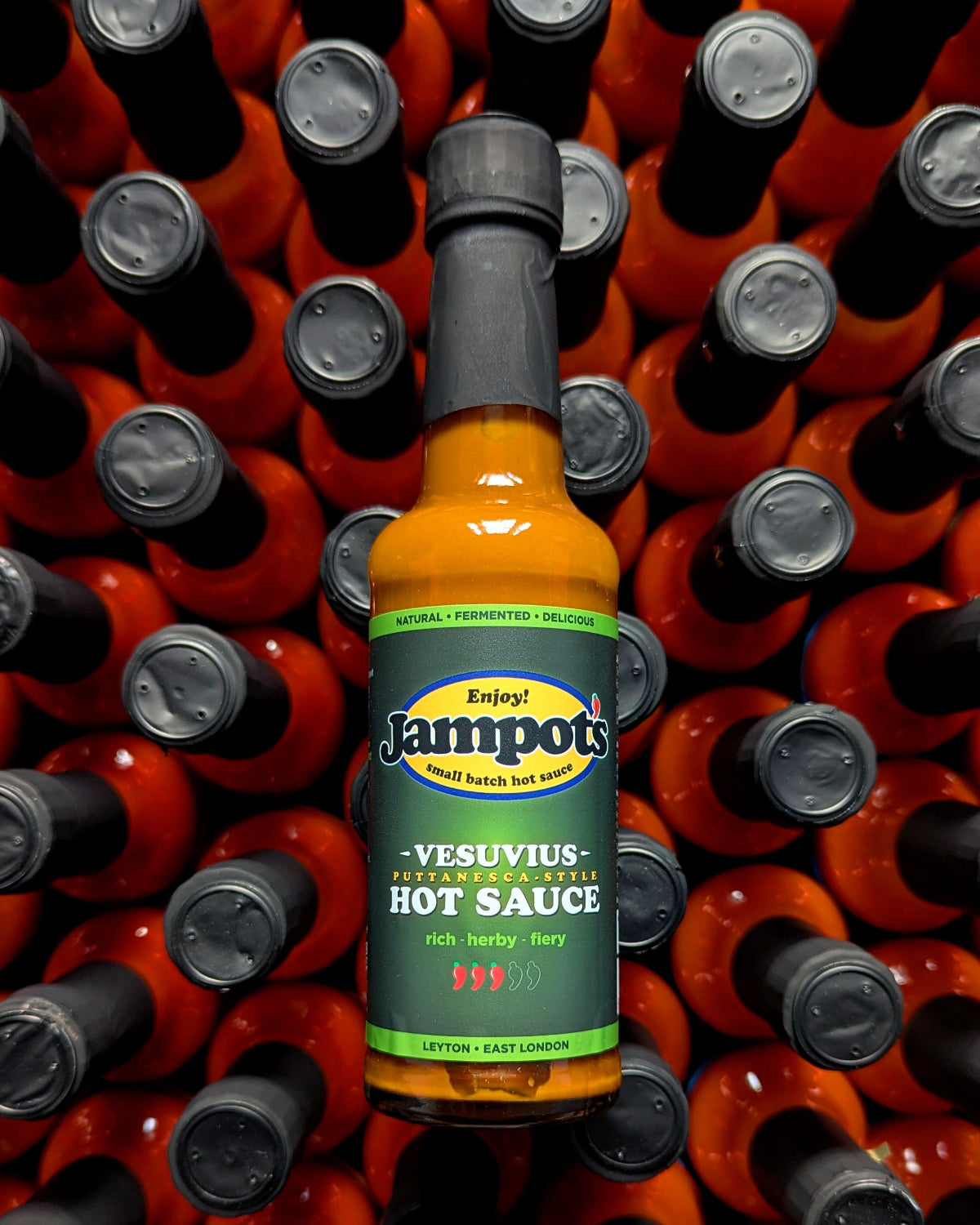 Jampot's Vesuvius Puttanesca style hot sauce in a glass bottle